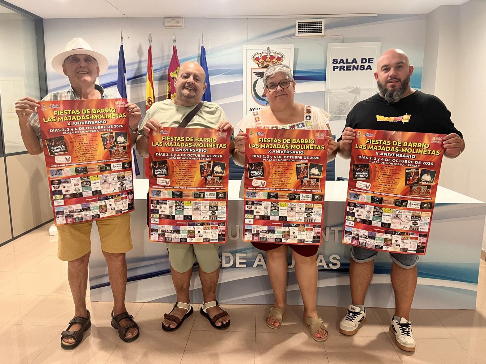 Carteles de las Fiestas de Barrio de Las Majadas-Molinetas en la sala de prensa del Ayuntamiento de Águilas